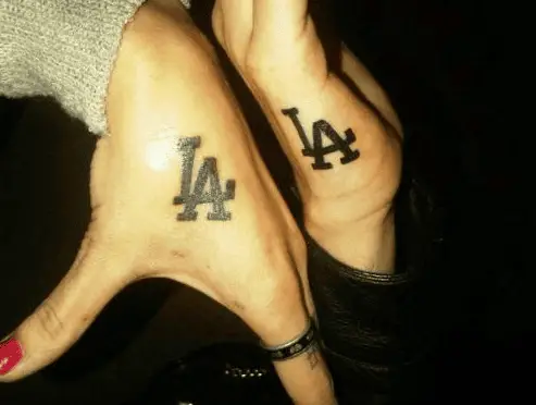Bold Font LA Hand Tattoo