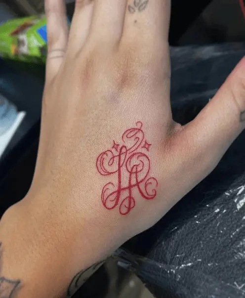 Red Ink LA Decorative Lettering Hand Tattoo