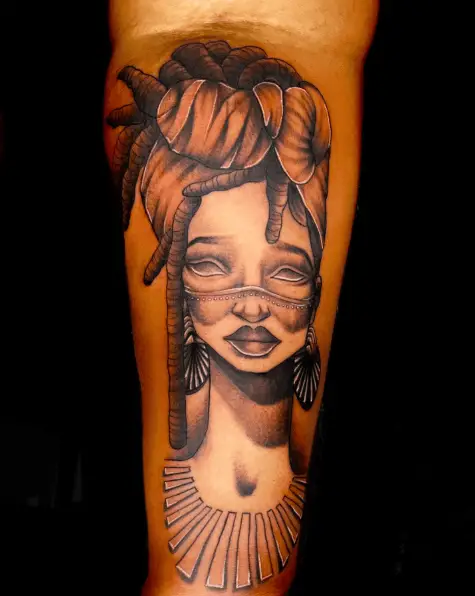 Black and Grey African Goddess Calf Tattoo