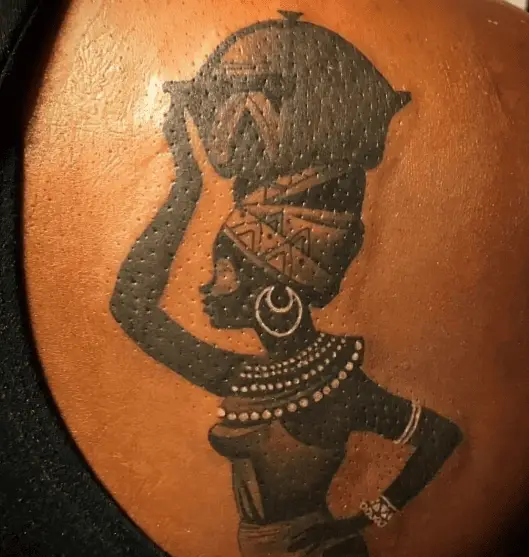 African Woman Carrying a Water Jug Tattoo
