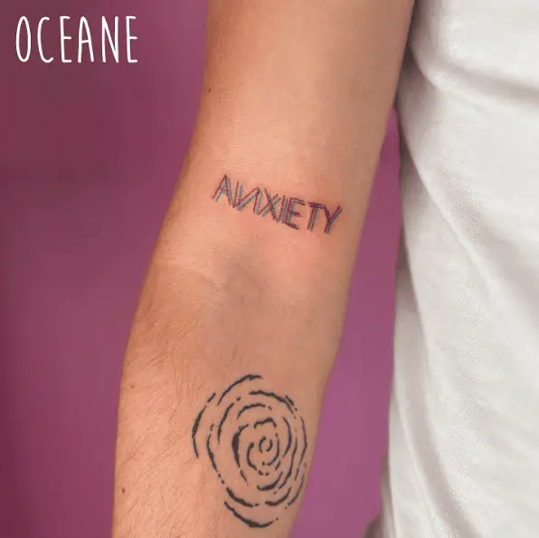 Shaded Style Anxiety Text Tattoo