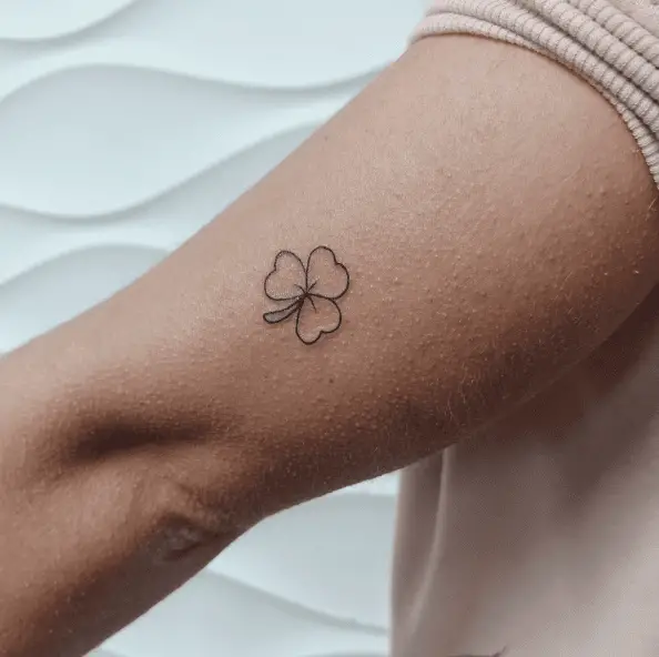 Tiny Shamrock Arm Line Tattoo