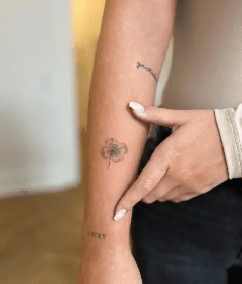 Tiny Shamrock Forearm Tattoo