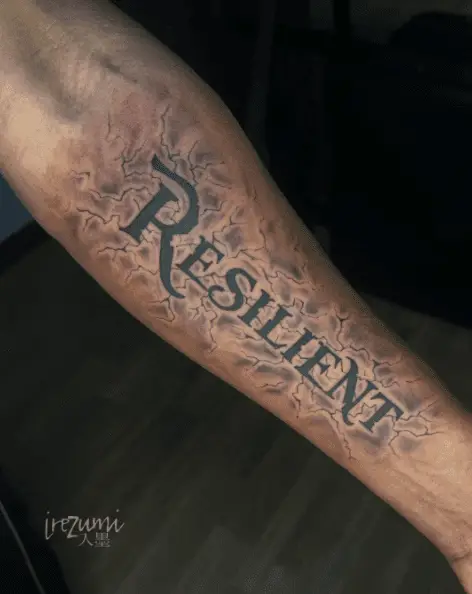 RESILIENT Text with Cracked Background Forearm Tattoo