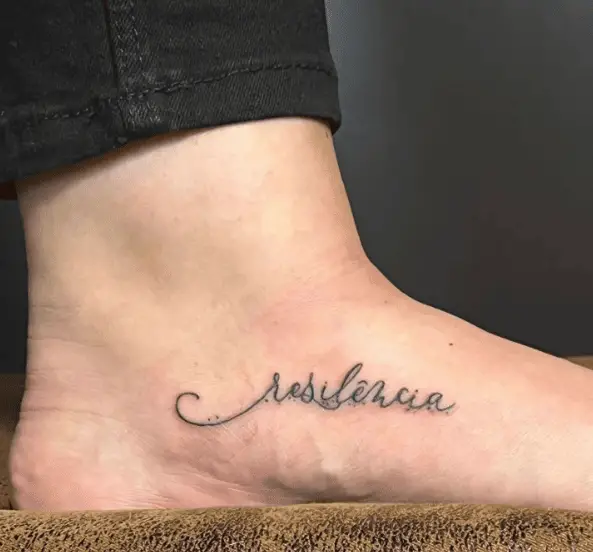 Spanish Resilience Text Foot Tattoo