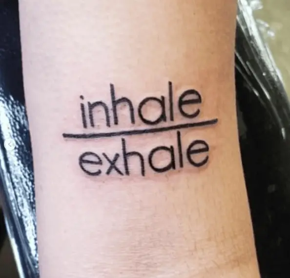 Bold Ink Inhale and Exhale Lettering Tattoo