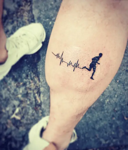 Black Ink Running Man with Heartbeat Tattoo