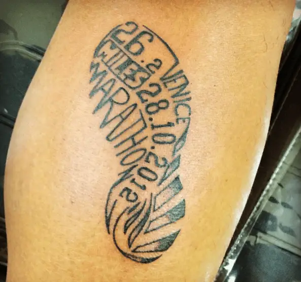 Shoe Shaped Tattoo with Distances Info and Marathon Lettering Tattoo