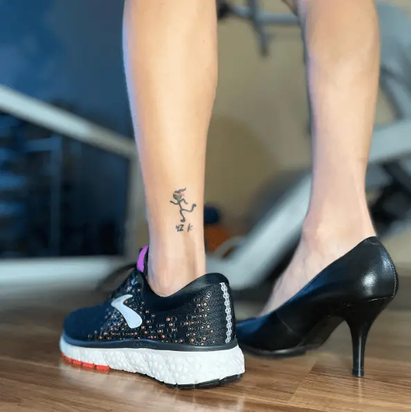 Tiny Running Woman with Distance Tattoo